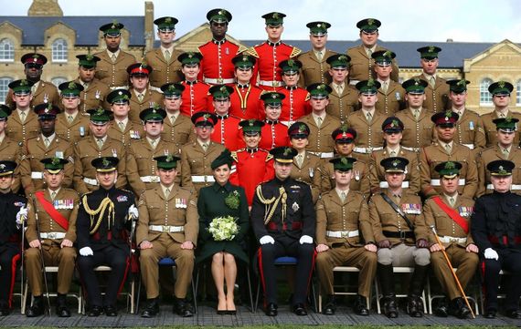 Catherine, Duchess of Cambridge and Prince William, Duke of Cambridge pose for a photograph with officers and guardsmen of 1st Battalion the Irish Guards during the regiment's St Patrick's Day parade at Cavalry Barracks on March 17, 2019 in Hounslow, England. (Photo by Gareth Fuller - WPA Pool/Getty Images)