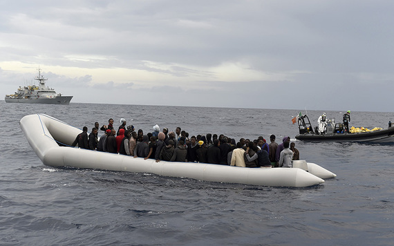 Migrants being rescued at sea.