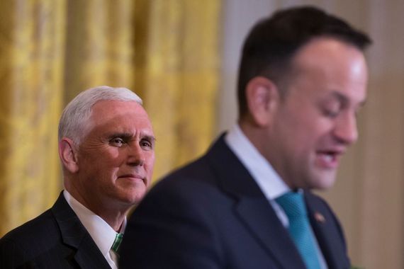 Pence listening to Varadkar last St Patrick's Day. Image: Getty.