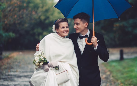 resized rain wedding couple istock