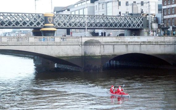 Irish Santas row the Liffey in Dublin. Photo: Tourism Ireland