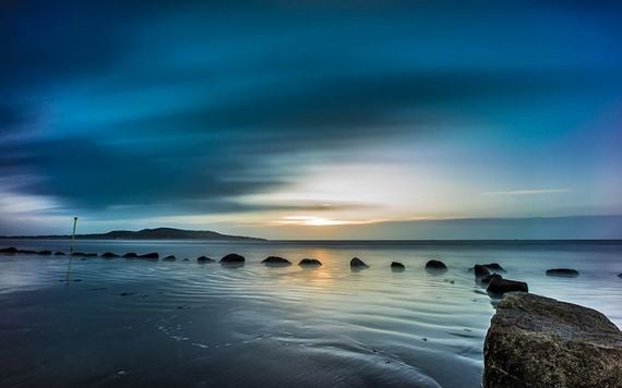 The sun just peeping up from Bull Island in Dublin. Photo: Giuseppe Milo on Flickr/Creative Commons