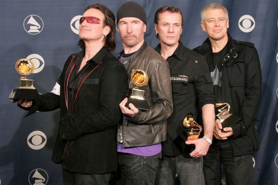 Bono, The Edge, Larry Mullen, and Adam Clayton of the band U2 pose with their award for "Best Rock Performance by a Group" backstage during the 47th Annual Grammy Awards at the Staples Center February 13, 2005 in Los Angeles, California. Image: Getty