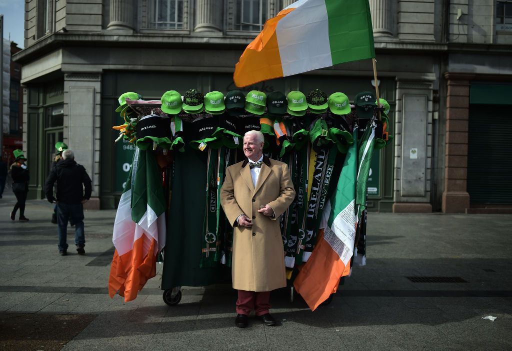 Street seller Michael Halliday stands beside his stall before the annual Saint Patrick's Day parade on March 17, 2019, in Dublin, Ireland. (Photo by Charles McQuillan/Getty Images)