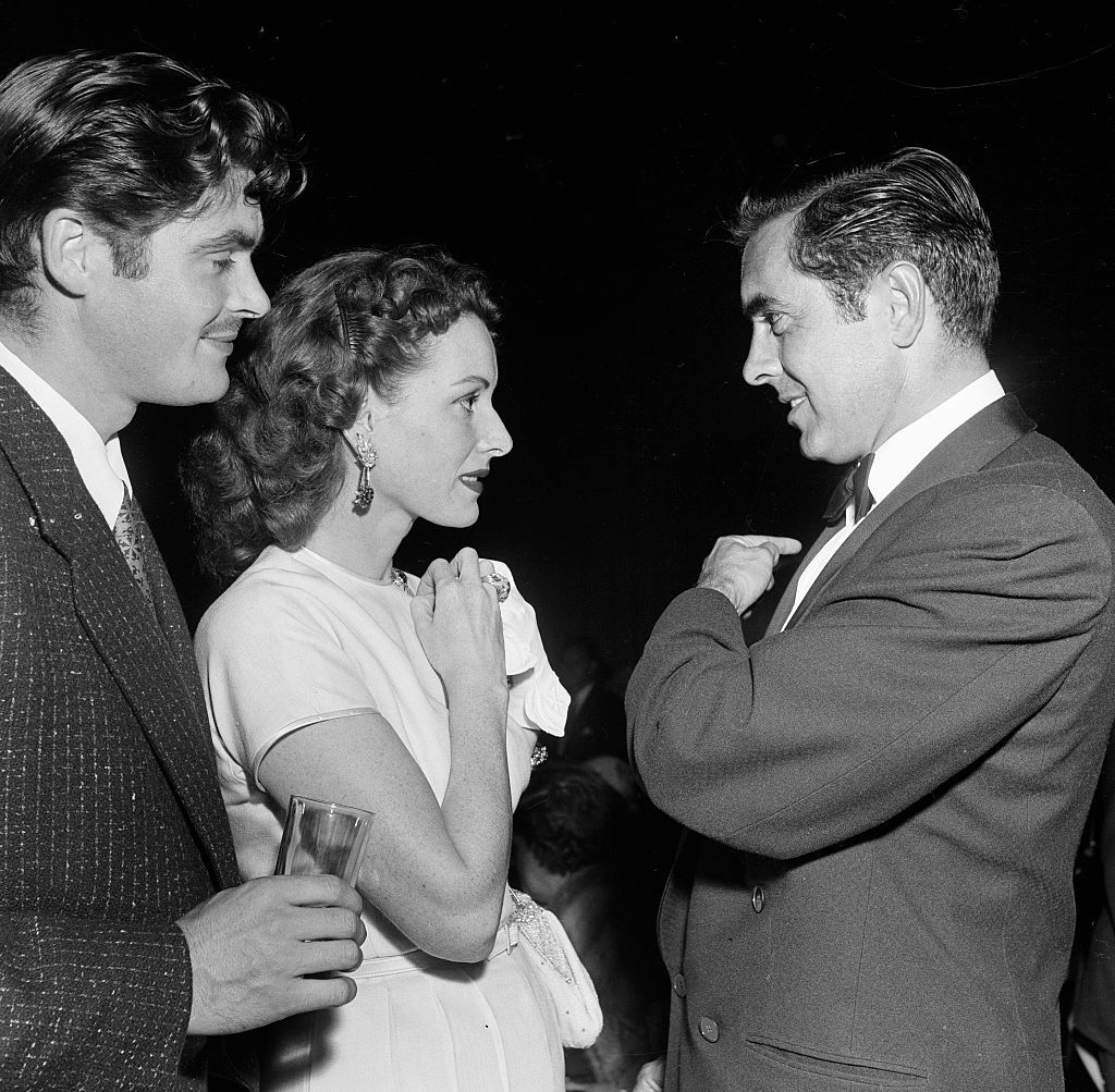 Actor Tyrone Power talks with actress Maureen O'Hara during the CBS party of the "Ed Sullivan Show" in Los Angeles,CA. (Photo by Earl Leaf/Michael Ochs Archives/Getty Images)