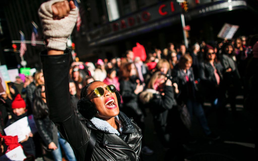A woman shouts slogans during the Women's March in New York City, January 20, 2018. Image credit: KENA BETANCUR/AFP/Getty Images.
